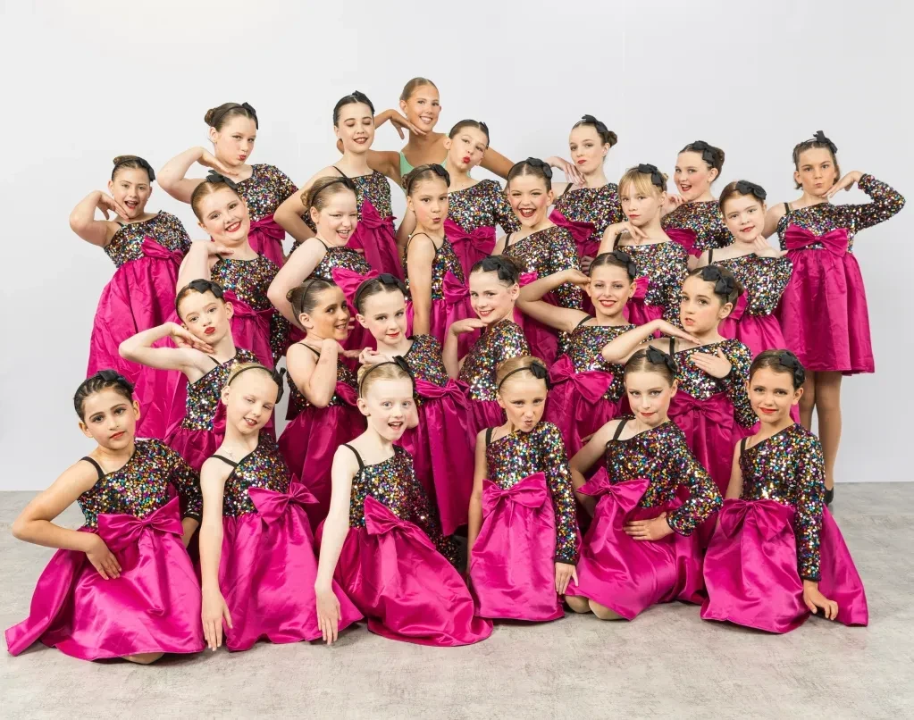 Children's dance group in sequin dresses